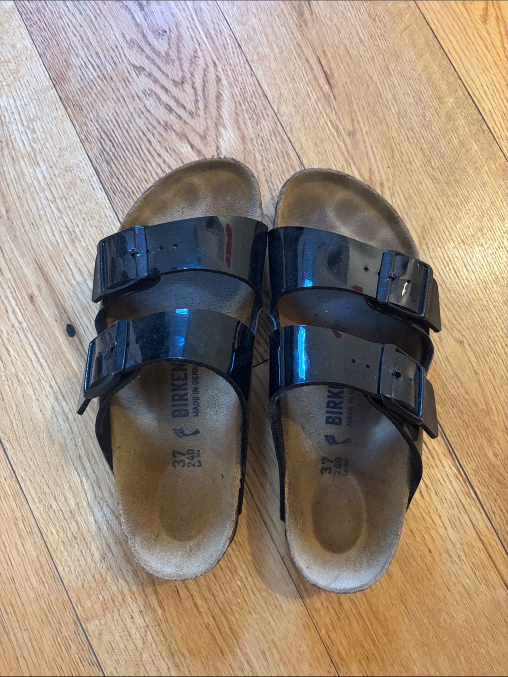 Birkenstock women’s Arizona Patent Two-Strap Sandals in Black
